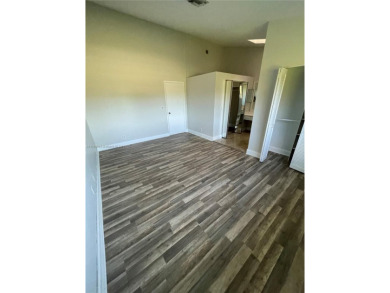 *Spacious Townhome in Woodmont's Jasmine on the Green Community*
 on Woodmont Country Club in Florida - for sale on GolfHomes.com, golf home, golf lot