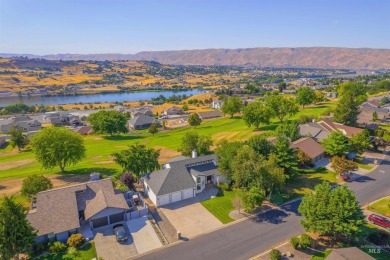 Front-row fairway views, stunning sunsets, and timeless on Lewiston Golf and Country Club in Idaho - for sale on GolfHomes.com, golf home, golf lot