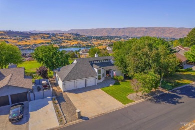 Front-row fairway views, stunning sunsets, and timeless on Lewiston Golf and Country Club in Idaho - for sale on GolfHomes.com, golf home, golf lot