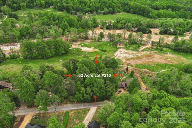 Very scenic 0.62-acre virtually flat lot in Linville Falls on Linville Falls Golf Club in North Carolina - for sale on GolfHomes.com, golf home, golf lot