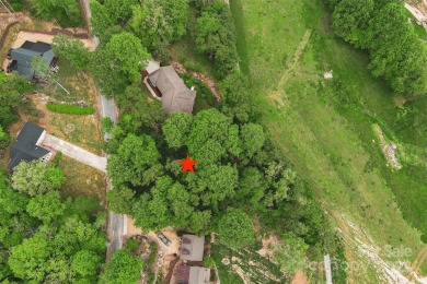 Very scenic 0.62-acre virtually flat lot in Linville Falls on Linville Falls Golf Club in North Carolina - for sale on GolfHomes.com, golf home, golf lot