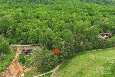 Very scenic 0.62-acre virtually flat lot in Linville Falls on Linville Falls Golf Club in North Carolina - for sale on GolfHomes.com, golf home, golf lot