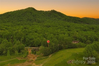 Very scenic 0.62-acre virtually flat lot in Linville Falls on Linville Falls Golf Club in North Carolina - for sale on GolfHomes.com, golf home, golf lot