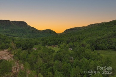 Very scenic 0.62-acre virtually flat lot in Linville Falls on Linville Falls Golf Club in North Carolina - for sale on GolfHomes.com, golf home, golf lot