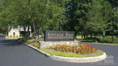 Very scenic 0.62-acre virtually flat lot in Linville Falls on Linville Falls Golf Club in North Carolina - for sale on GolfHomes.com, golf home, golf lot