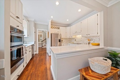 This exquisite brick townhome overlooks the 7th green of the on Lochmere Golf Club in North Carolina - for sale on GolfHomes.com, golf home, golf lot
