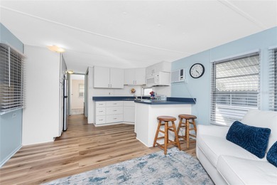 Simplify life with this charming turnkey-furnished mobile home on Boca Royale Golf and Country Club in Florida - for sale on GolfHomes.com, golf home, golf lot