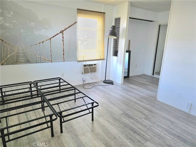 This home is located in a 55 and older private gated community on Bixby Village Golf Course in California - for sale on GolfHomes.com, golf home, golf lot