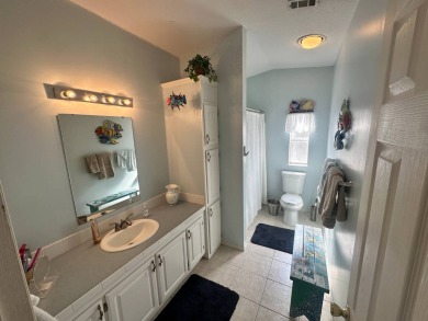 Beautiful stucco home on a quiet cul de sac. Tastefully updated on Del Tura Golf and Country Club in Florida - for sale on GolfHomes.com, golf home, golf lot