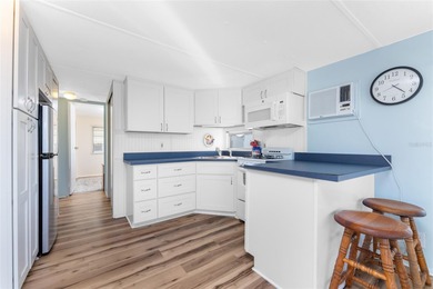 Simplify life with this charming turnkey-furnished mobile home on Boca Royale Golf and Country Club in Florida - for sale on GolfHomes.com, golf home, golf lot