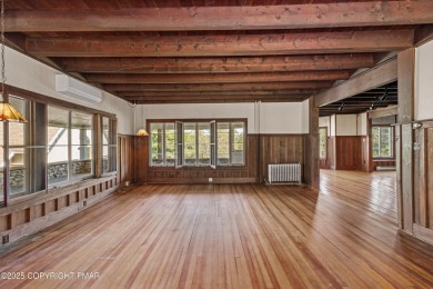 A rare architectural treasure, 'Cottage 300' is a 5-bedroom, 3 on Buck Hill Golf Club  in Pennsylvania - for sale on GolfHomes.com, golf home, golf lot
