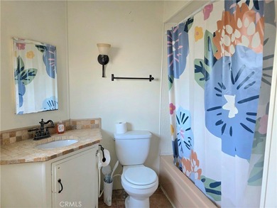 This home is located in a 55 and older private gated community on Bixby Village Golf Course in California - for sale on GolfHomes.com, golf home, golf lot