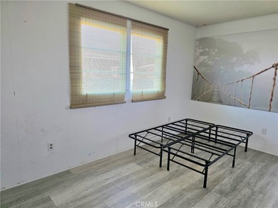 This home is located in a 55 and older private gated community on Bixby Village Golf Course in California - for sale on GolfHomes.com, golf home, golf lot