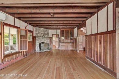 A rare architectural treasure, 'Cottage 300' is a 5-bedroom, 3 on Buck Hill Golf Club  in Pennsylvania - for sale on GolfHomes.com, golf home, golf lot