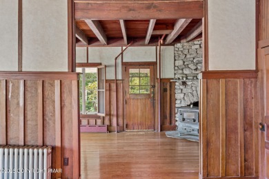 A rare architectural treasure, 'Cottage 300' is a 5-bedroom, 3 on Buck Hill Golf Club  in Pennsylvania - for sale on GolfHomes.com, golf home, golf lot