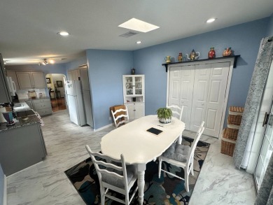 Beautiful stucco home on a quiet cul de sac. Tastefully updated on Del Tura Golf and Country Club in Florida - for sale on GolfHomes.com, golf home, golf lot