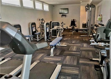 This home is located in a 55 and older private gated community on Bixby Village Golf Course in California - for sale on GolfHomes.com, golf home, golf lot