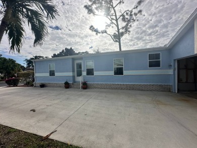 Beautiful stucco home on a quiet cul de sac. Tastefully updated on Del Tura Golf and Country Club in Florida - for sale on GolfHomes.com, golf home, golf lot