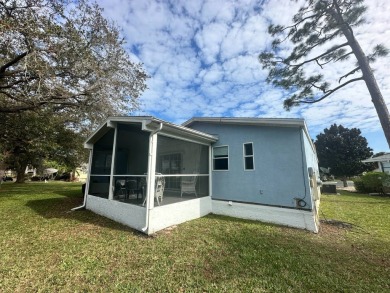Beautiful stucco home on a quiet cul de sac. Tastefully updated on Del Tura Golf and Country Club in Florida - for sale on GolfHomes.com, golf home, golf lot