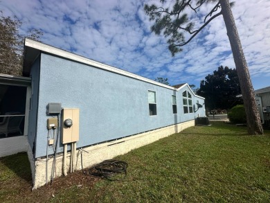 Beautiful stucco home on a quiet cul de sac. Tastefully updated on Del Tura Golf and Country Club in Florida - for sale on GolfHomes.com, golf home, golf lot