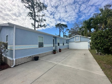 Beautiful stucco home on a quiet cul de sac. Tastefully updated on Del Tura Golf and Country Club in Florida - for sale on GolfHomes.com, golf home, golf lot