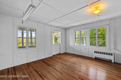 A rare architectural treasure, 'Cottage 300' is a 5-bedroom, 3 on Buck Hill Golf Club  in Pennsylvania - for sale on GolfHomes.com, golf home, golf lot