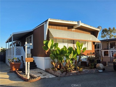 This home is located in a 55 and older private gated community on Bixby Village Golf Course in California - for sale on GolfHomes.com, golf home, golf lot