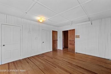 A rare architectural treasure, 'Cottage 300' is a 5-bedroom, 3 on Buck Hill Golf Club  in Pennsylvania - for sale on GolfHomes.com, golf home, golf lot