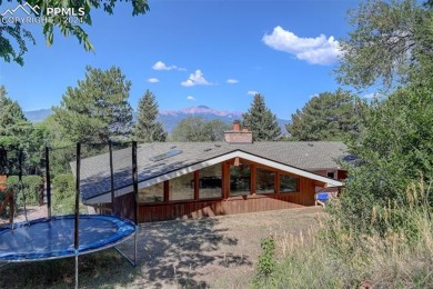 Welcome to this meticulously maintained mid-century home on Colorado Springs Country Club in Colorado - for sale on GolfHomes.com, golf home, golf lot