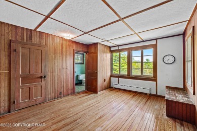 A rare architectural treasure, 'Cottage 300' is a 5-bedroom, 3 on Buck Hill Golf Club  in Pennsylvania - for sale on GolfHomes.com, golf home, golf lot