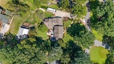 Tucked away on a quiet cul-de-sac in the prestigious Forest Oaks on Forest Oaks Country Club in North Carolina - for sale on GolfHomes.com, golf home, golf lot
