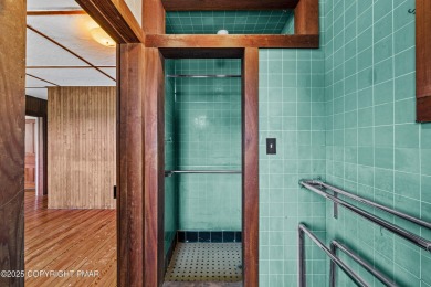 A rare architectural treasure, 'Cottage 300' is a 5-bedroom, 3 on Buck Hill Golf Club  in Pennsylvania - for sale on GolfHomes.com, golf home, golf lot