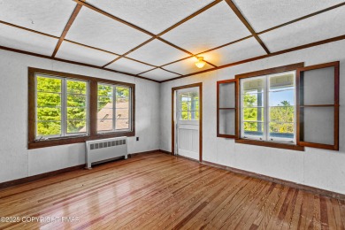A rare architectural treasure, 'Cottage 300' is a 5-bedroom, 3 on Buck Hill Golf Club  in Pennsylvania - for sale on GolfHomes.com, golf home, golf lot