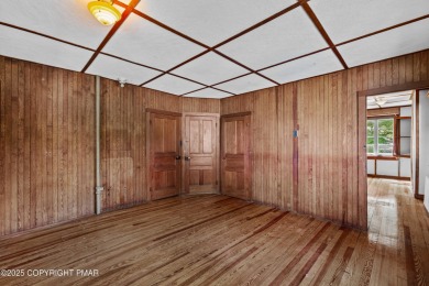 A rare architectural treasure, 'Cottage 300' is a 5-bedroom, 3 on Buck Hill Golf Club  in Pennsylvania - for sale on GolfHomes.com, golf home, golf lot