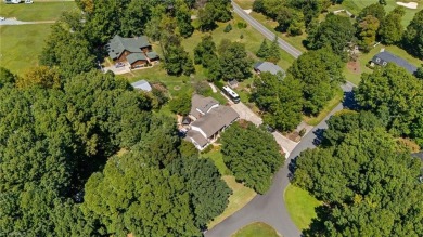 Tucked away on a quiet cul-de-sac in the prestigious Forest Oaks on Forest Oaks Country Club in North Carolina - for sale on GolfHomes.com, golf home, golf lot