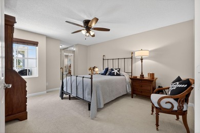 Extremely well-maintained villa with 2 car garage overlooking on The Golf Club of Jupiter in Florida - for sale on GolfHomes.com, golf home, golf lot