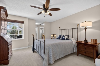 Extremely well-maintained villa with 2 car garage overlooking on The Golf Club of Jupiter in Florida - for sale on GolfHomes.com, golf home, golf lot