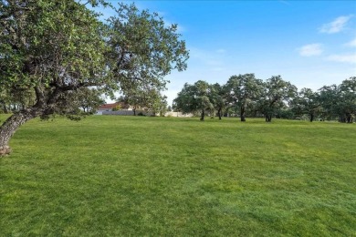 Nestled within the prestigious Barton Creek Lakeside community on Palmer Lakeside At Barton Creek in Texas - for sale on GolfHomes.com, golf home, golf lot