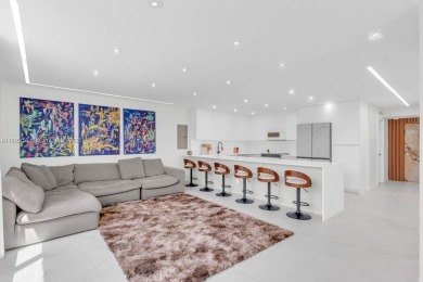 Step into modern elegance with this beautifully renovated on Turnberry Isle Resort and Club in Florida - for sale on GolfHomes.com, golf home, golf lot