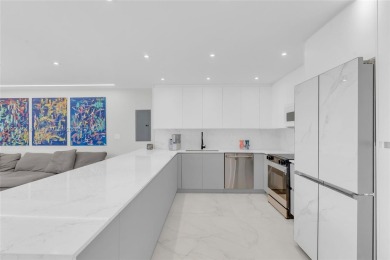 Step into modern elegance with this beautifully renovated on Turnberry Isle Resort and Club in Florida - for sale on GolfHomes.com, golf home, golf lot