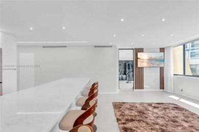 Step into modern elegance with this beautifully renovated on Turnberry Isle Resort and Club in Florida - for sale on GolfHomes.com, golf home, golf lot
