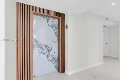 Step into modern elegance with this beautifully renovated on Turnberry Isle Resort and Club in Florida - for sale on GolfHomes.com, golf home, golf lot