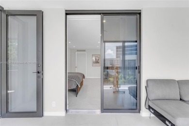 Step into modern elegance with this beautifully renovated on Turnberry Isle Resort and Club in Florida - for sale on GolfHomes.com, golf home, golf lot