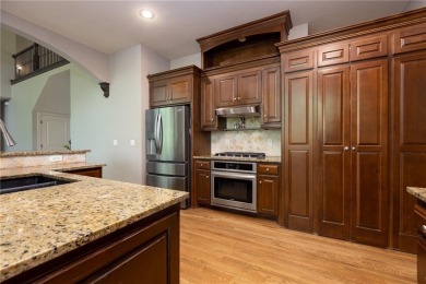 Welcome to this stunning 1.5-story home nestled on a quiet on Staley Farms Golf Club in Missouri - for sale on GolfHomes.com, golf home, golf lot