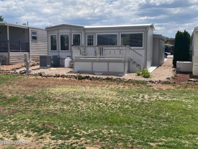 This bright, newly remodeled park model is located on the golf on Juniper Ridge R.V. Golf Resort in Arizona - for sale on GolfHomes.com, golf home, golf lot