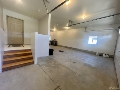 This home offers a rare opportunity to put your own finishing on Escanaba Country Club in Michigan - for sale on GolfHomes.com, golf home, golf lot