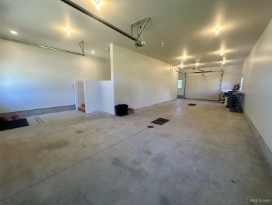 This home offers a rare opportunity to put your own finishing on Escanaba Country Club in Michigan - for sale on GolfHomes.com, golf home, golf lot