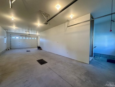 This home offers a rare opportunity to put your own finishing on Escanaba Country Club in Michigan - for sale on GolfHomes.com, golf home, golf lot