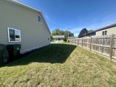 This home offers a rare opportunity to put your own finishing on Escanaba Country Club in Michigan - for sale on GolfHomes.com, golf home, golf lot