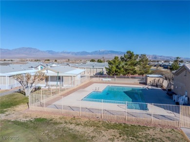 Discover this beautifully maintained manufactured home in the on Desert Greens Golf Course in Nevada - for sale on GolfHomes.com, golf home, golf lot